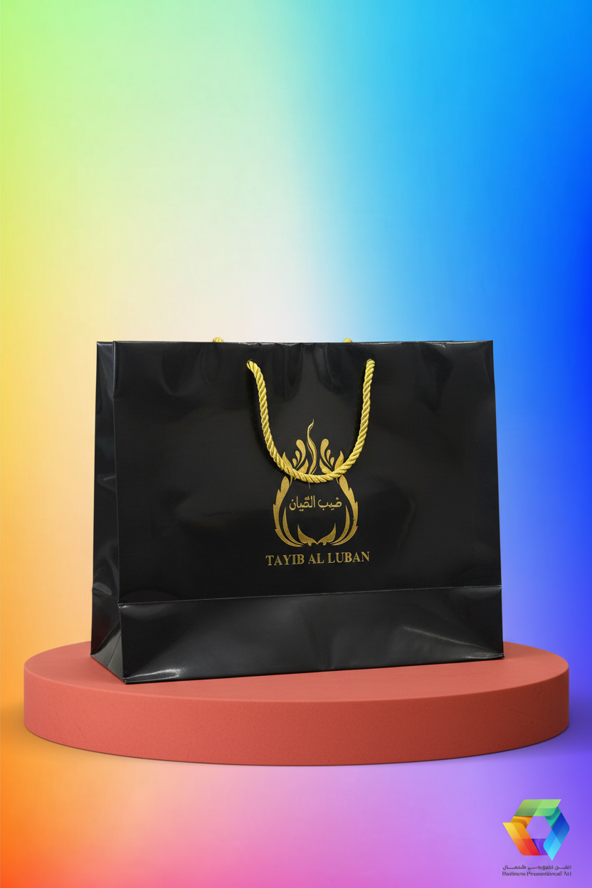 Custom printed matte black landscape paper bag with gold rope handles - BPA packaging