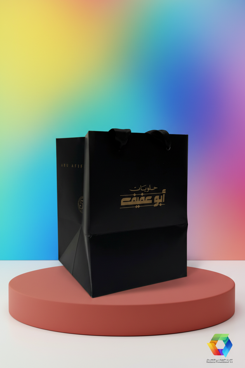Custom printed matte black paper bag with ribbon handles - BPA packaging